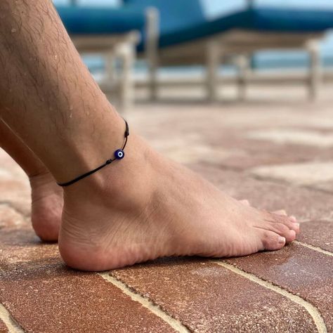 Protect your energy and enhance your style with our Evil Eye Anklet. This adjustable, waterproof ankle bracelet features a lucky eye charm, making it perfect for women, men, and teens. Crafted with a durable cord, it’s ideal for the beach, surfing, or any outdoor activity. The unisex design ensures it's a versatile accessory for anyone. Enjoy both protection and fashion with this anklet, perfect for everyday wear and summer adventures. Evil Eye Anklet, Protect Your Energy, Beach Surfing, Bracelet Pack, Awareness Bracelet, Charm Making, Ankle Bracelet, Anklet Bracelet, Crystal Charm