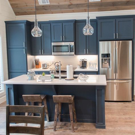 Deer Pines cabin, with SW7615, Sea Serpent on the cabinets.  Love (LOVE!) this color in this space.  Booking now at link in profile.… Pine Cabin, Sea Serpent, Lake Cabins, Kitchen Cabinet Colors, Cabinet Colors, Kitchen Paint, Painting Kitchen Cabinets, Updating House, Kitchen Redo