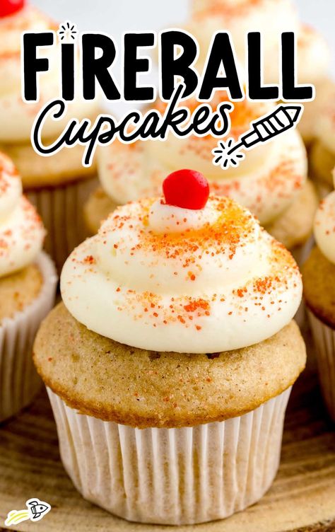 a close up shot of a Fireball Cupcakes on a wooden stand Fireball Cupcakes, Whiskey Desserts, Alcoholic Cupcakes, Fireball Recipes, Boozy Baking, Infused Cupcakes, Boozy Cupcakes, Cupcake Decorating Tips, Bakers Gonna Bake