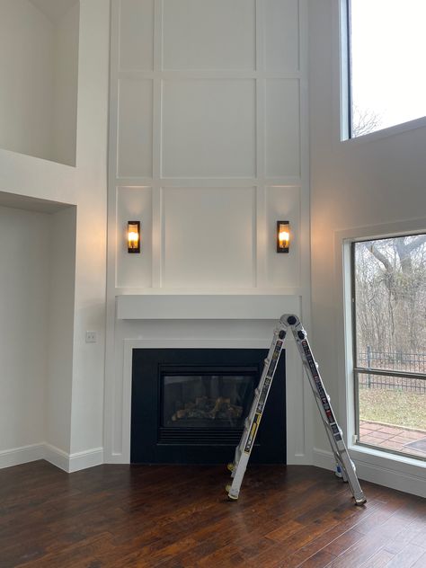 Corner Fireplace With High Ceiling, Corner Fireplace Tall Ceilings, Corner Fireplace With Tall Ceiling, Trimmed Fireplace Wall, Corner Fireplace High Ceiling, Tall Corner Fireplace Wall High Ceilings, Accent Wall Ideas High Ceilings, Vault Ceiling Fireplace, Two Story Corner Fireplace Ideas