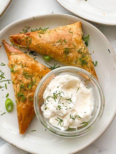 Spanakopita Triangles Recipe, Spanakopita Triangles, Spanakopita Recipe, Greek Spinach, Cheese Pie, Famous Recipe, Phyllo Dough, Mediterranean Cuisine, Frozen Spinach