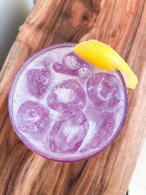 Taylor Swift Lavender Haze TikTok Cocktail Review (With Video) - Parade: Entertainment, Recipes, Health, Life, Holidays Taylor Swift Lavender Haze, Taylor Swift Lavender, Purple Drink, Lavender Cocktail, Taylor Swift Birthday Party Ideas, Purple Cocktails, Purple Drinks, Culinary Lavender, Lavender Syrup