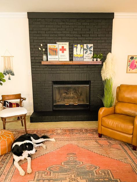 Black Fireplace with Wood Mantel Dark Grey Fireplace Brick, Painted Black Fireplace, Bold Fireplace, Painting A Fireplace, Black Fireplace Ideas, Painting A Brick Fireplace, Brick Fireplace Black, Painted Fireplaces, Living Room Ideas Colorful