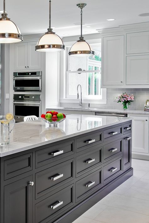 White quartzite island countertop complements the polished white counter on the kitchen side. #whitequartzitekitchencountertop #whitequartzitekitchencounter #whitequartzitekitchentop #whitequartzitecolors #whitequartzitethatlookslikemarble #whitekitchencabinet #darkislandcabinet #whitecabinetry #espressocolorislandcabinetry #graysubwaybacksplashtile #grayporcelainfloortile #kitchenpendantlight #recesslight #whitecabinetwhitequartzite #darkcabinetwhitequartzitetop Kitchen Dark Island, Diy Kitchen Countertop Makeover, Gray Subway Backsplash, Kitchen Countertop Makeover, Stone Countertops Kitchen, Grey Kitchen Walls, White Kitchen Countertops, Dark Brown Cabinets, Light Grey Kitchens