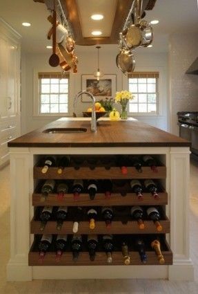 Kitchen island with built-in wine rack, butcher block countertop, ...edge of the counter! Ad Kitchen, Butcher Block Countertop, Butcher Block Island Kitchen, Built In Wine Rack, Diy Kitchen Island, Butcher Block Countertops, Trendy Kitchen, Traditional Kitchen, Wine Storage