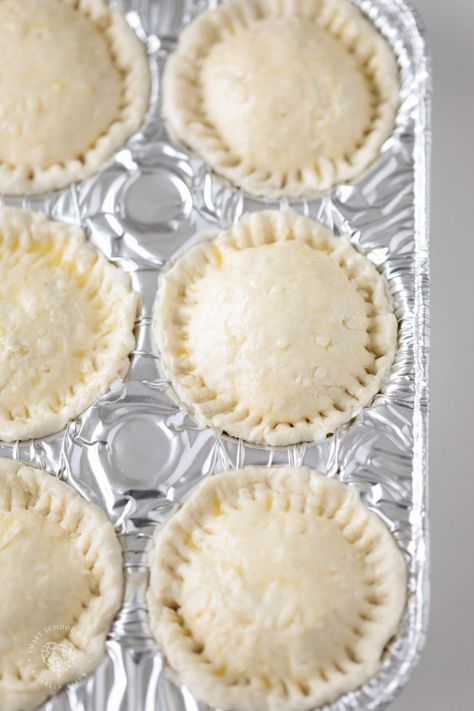 How to make pot pies with biscuits in a muffin tin Mini Chicken Pot Pies Muffin Tins, Muffin Tin Pot Pie, Pot Pies With Biscuits, Pot Pie Muffin Tin, Canned Biscuit Recipes, Biscuit Pot Pie, Homemade Pot Pie, Chicken Pies, Mini Pot Pies