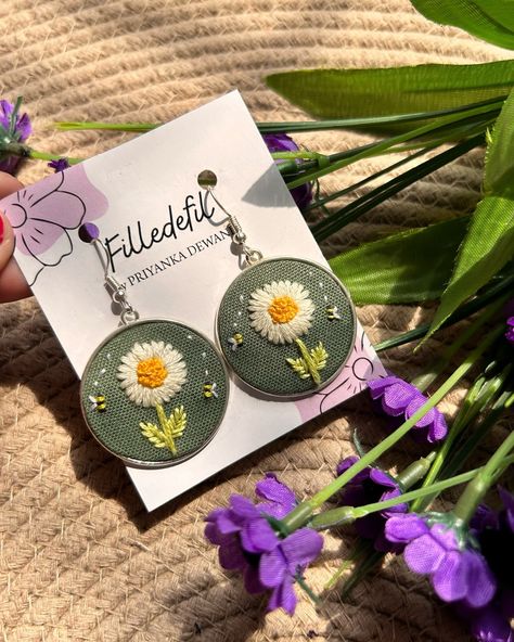 Embroidered Daisy Earrings 🌼🤍🎀 DM to SHOP 💌 Shipping all over India 📦 #earrings #embroideryearrings #earring #handmade #handmadewithlove #handembroidered #daisy #daisylove #daisys #handemadejewelry #shopsmall #artisticearrings #artisticjewelry #nagpur Artistic Earrings, Daisy Love, Earring Handmade, Daisy Earrings, Artistic Jewelry, Small Shop, Hand Embroidered, Daisy, India