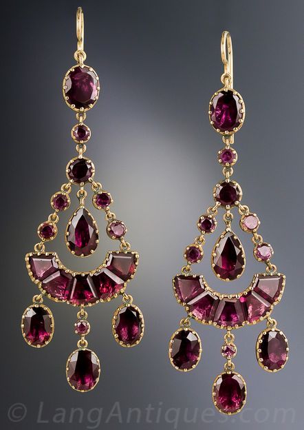 Antique Chandelier Garnet Earrings, Simply stunning, early-Victorian (maybe Georgian), almost 2 1/2 inches long drop earrings glistening with a multiplicity of multi-shaped, rich raspberry colored garnets, lovingly hand crafted and backed in 14K yellow gold. Rare, ravishing and romantic. 2 3/8 inches long and ust over 7/8 inch at the widest points. The earwires were added at a later date.: Gaun Abad Pertengahan, Bijoux Art Nouveau, Georgian Jewelry, Antique Chandelier, Garnet Jewelry, Long Drop Earrings, Garnet Earrings, Victorian Jewelry, Antique Earrings