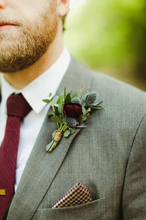 Groom's Gray Suit with Burgundy Accessories and Ranunculus and Thistle Boutonniere Boutinere Ideas, Boutinere Ideas Groomsmen, Dresses For Hot Weather, Burgundy Ranunculus, Thistle Boutonniere, Burgundy Accessories, Ranunculus Boutonniere, Ranunculus Wedding, Mandap Decoration