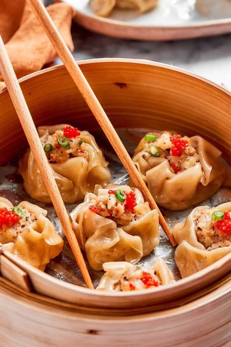 This Shrimp Shumai recipe features tender steamed dumplings stuffed with a savory blend of succulent shrimp and earthy mushrooms, plus fresh ginger and garlic. Enjoy this easy dim sum recipe at home, with soy sauce for dipping! Shrimp Shumai Recipe, Shumai Recipe, Shrimp Shumai, Dim Sum Recipe, Dim Sum Dumplings, Dim Sum Recipes, Steamed Shrimp, Steamed Dumplings, Dumpling Recipe