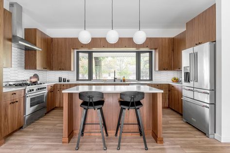 This Midcentury Modern Kitchen Renovation is a Not-to-Miss! Backsplash Around Kitchen Window, Mid Century Modern Walnut Kitchen, White Hexagon Backsplash, Tile And Wallpaper, Kitchen Window Ideas, Midcentury Modern Kitchen, Designers Studio, Decorate Kitchen, Modern Kitchen Renovation