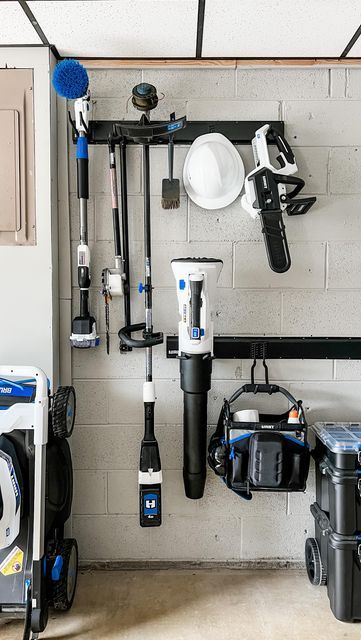 Garage Storage Ideas For Lawn Equipment, Garage Organization Yard Tools, Garage Lawn Equipment Storage, Blower Storage Ideas, Lawn Equipment Storage Ideas, Lawn Chair Storage Garage, Lawn Equipment Storage, Charger Ideas, Cleaning Supply Storage