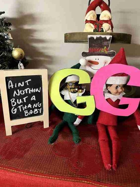 Funny Elf On The Shelf Arrival Ideas For 2023 - RecipeMagik Snoop Elf On The Shelf Ideas, Elf On The Shelf Ideas Snoop Dog, Ideas For Snoop On A Stoop, Elf And Snoop, Elf And Snoop Ideas, Elf On The Shelf Ideas Work, Snoop On A Stoop Elf Ideas, Snoop Dog Elf On The Shelf, Snoop Elf On Shelf