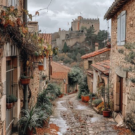 Medieval Village Street: A picturesque medieval village street lined with rustic houses and plants leading to a distant castle. #medieval #village #street #cobblestones #castle #aiart #aiphoto #stockcake ⬇️ Download and 📝 Prompt 👉 https://ayr.app/l/ihzY Castle With Village, Fantasy Village Aesthetic, Old Village Aesthetic, Medieval Village Aesthetic, Fantasy Village Art Medieval Town, Medieval Street Aesthetic, Medieval Village Layout, Medieval Coastal Village, Medieval Mountain Village