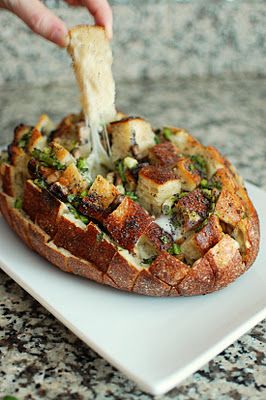 Cheesey Mushroom Pull Apart Bread - adapted from The Girl Who Ate Everything - serves 4-6   Printable Recipe   For the Mushrooms:  12 oz sliced mushrooms  1 Tbsp butter  1 Tbsp chopped fresh thyme    For the Bread:  1 unsliced loaf sourdough bread  12 ounces Provolone cheese, thinly sliced  1/2 cup butter, melted  1/2 cup finely diced green onion  2 teaspoons poppy seeds Cheesy Pull Apart Bread, Pan Relleno, Pull Apart Bread, Läcker Mat, God Mat, Provolone, Pull Apart, Tostadas, Food Items