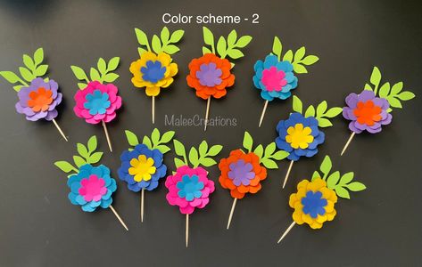 This listing is for a set of 12 flower cupcake toppers. These cupcake toppers will added a special touch to your fiesta/ Mexican themed party. Colors can be customize. Feel free to message me prior to ordering. Flower Cupcake Toppers, Mexican Themed Party, Coco Party, Luau Decorations, Fiesta Cake, Floral Cake Topper, Fiesta Theme Party, Fiesta Theme, Flower Cupcakes