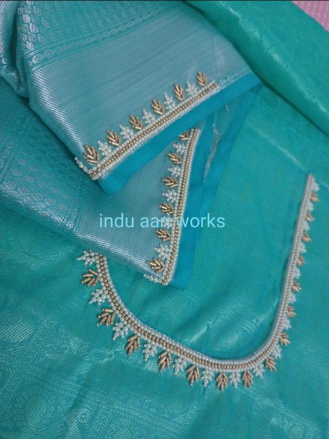 Simple Silver Maggam Work Blouses, Aari Work Silver Designs, Silver Colour Aari Work Blouse, Blouse Neck Work Designs, Silver Aari Work Blouse Simple Design, Silver Thread Work Blouse Designs, Blue Blouse Aari Work Designs, Silver Jari Work Blouse Design, Silver Maggam Work Blouse Designs