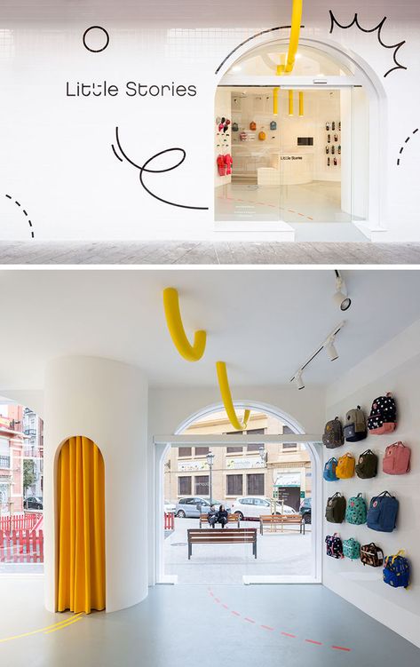 A Bright White Facade Helps "Little Stories" Stand Out In This Spanish Neighborhood Spanish Neighborhood, White Facade, Tor Design, Retail Space Design, Kindergarten Design, Storefront Design, Retail Store Design, Store Ideas, Boutique Interior