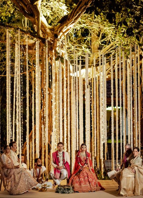 The gleaming atmosphere was incorporated with beautiful florals and bright embellishments.





#goa #wedding #weddingdesign #designer #details #florals #weddinginspiration #floraldesigner #groom #couple #bridalwear #bride #bridal #beautiful #blissful #weddingdecor #indianwedding #destinationwedding South Indian Wedding Aesthetic Decor, Outdoor Desi Wedding, Simple Indian Wedding Decorations, Mehndi Event Decoration, Reception Candles, Mehndi Stage Decor, Indian Wedding Deco, Minimal Wedding Decor, Buddhist Wedding