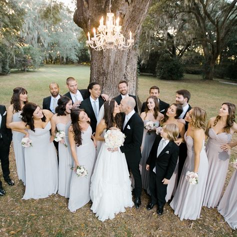 Groomsmen wore black tuxedos with matching gray ties to match the bridesmaids gray formal-length dresses. Bridesmaid Dress Black, Grey Bridesmaid Dress, Romantic Outdoor Wedding, Grey Bridesmaid Dresses, Black Bridal, Greek Wedding, Wedding News, Black Bridesmaid Dresses, Cute Wedding Ideas