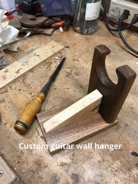 Using scraps from the scrap bin. Walnut, Honduras mahogany, maple. Diy Guitar Hanger Wall Mount, Guitar Holder Wall Diy, Guitar Hanger Ideas, Baseball Bat Rack, Guitar Hangers, Guitar Wall Mount, Guitar Hook, Cool Things To Build, Guitar Wall Hanger