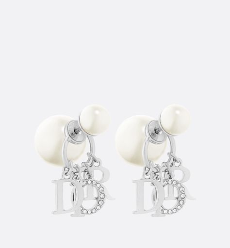 The dior tribales earrings offer a new variation on an iconic house style. The white resin pearls are embellished with 'd.i.o.r.' letters in silver-finish metal, with the letter 'o' in a pavé of white crystals. These bold earrings can be paired with other styles from the dio(r)evolution line. The characteristics: white resin pearls   white crystals   'd.i.o.r.' signature   letter charms   silver-finish metal   integrated clasp on the rear pearl   sold as a pair   made in germany Life Necessities, Earrings Dior, Maui Elopement, Navy Earrings, Dior Earrings, Letter Earrings, Silver Pearl Earrings, Gucci Jewelry, Aesthetic Jewelry