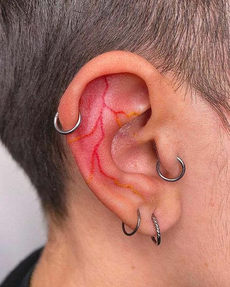 Ear Lobe Tattoo, Tattoo Lightning, Ear Tats, Inner Ear Tattoo, Ehlers Danlos Syndrome Awareness, Electric Tattoo, Lightning Tattoo, Ear Tattoo Ideas, Ear Tattoos