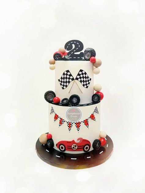 Racing Theme Cake #racing #racingcar  #cartheme #carthemecake #2ndbirthday #kidsbirthday #customcakes #sumptuoustreats #torontocakedecorator #cakes #torontocakes   www.sumptuoustreats.com First Lap Birthday Cake, Too Fast Birthday Cake, Two Fast Birthday Party Boy Cake, Racing Car Cake For Boys, Race Theme Cake, 2 Fast Cake, Racing Theme Cake, 2 Fast Birthday Cake, Formula One Cake