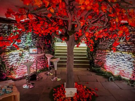 a stunning red tree in the centre of the space, filling the area with it's luxurious red leaves and foliage. Red Autumn, Maple Trees, Autumn Tree, Faux Tree, Autumn Colours, Artificial Trees, Event Themes, Maple Tree, Autumn Trees