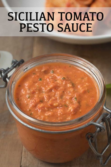 A classic, Italian, no cook sauce. Sicilian Tomato Pesto Sauce is made with Sweet cherry tomatoes, fresh basil garlic and almonds #tomatopesto #pestoallatrapanese #sicilianpesto Appetizers Using Basil Pesto, Creamy Tomato Pesto Sauce, Cherry Tomato Pesto, Sicilian Pesto Recipe, Mediterranean Pesto, Tomato Pesto Recipe, Tomato Pesto Pasta, Tomato Pesto Sauce, Italian Sauces