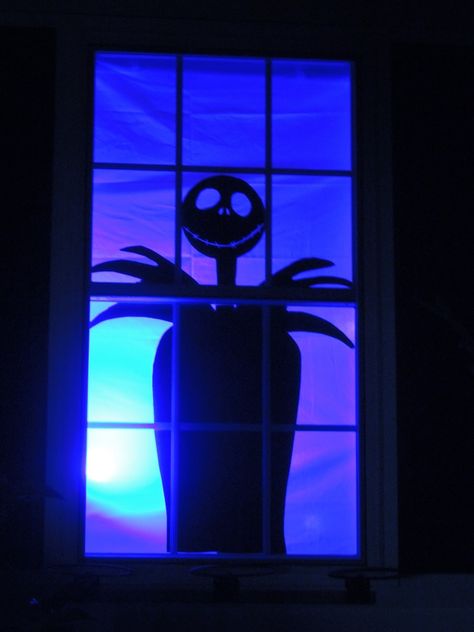 Jack Skellington! Nightmare Before Christmas Halloween window decor. Easy silhouette! Construction paper, white sheet, colored light bulb! Halloween Decor For Windows, Diy Halloween Decorations Nightmare Before Christmas, Nightmare Before Halloween Decorations, Halloween Window Decorations Ideas, The Nightmare Before Christmas Halloween Decorations, Halloween Window Cutouts, Easy Halloween Window Decorations, Halloween Window Decorations Diy, Nbc Halloween Decor