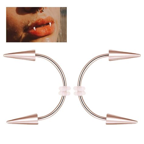 PRICES MAY VARY. PACKAGE: 2PC rose golden tiger teeth nail rings. MATERIAL & SIZE: Stainless Steel; Thickness: 1.2mm (16G) Fangs Dentures Ring is suitable for all kinds of parties like cosplay or halloween. Vampire teeth ring can be used as lip studs, body piercing decorations. It is not recommended to wear it for a long time. PACKAGE:   2 x Rose Golden spike teeth ring MATERIAL:   Good Quality Stainless Steel   Thickness:  1.2mm (16G)   NOTE:  It is not recommended to wear it for a long time. Teeth Ring, Tiger Teeth, Nail Rings, Tooth Ring, Golden Spike, Tiger Tooth, Lip Stud, Smiley Piercing, Vampire Teeth