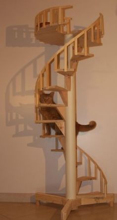 Spiral-Cat-Trees-Stairs-Real-Cabinet-Grade-Pine-handmade-in-USA  Would be great to have this in the back yard and build a cover over the top of the lookout tower. Cat Ceiling, Katt Diy, Diy Chat, Katt Grejer, Kat Diy, Chat Diy, Ceiling Details, Cat Stairs, Diy Cat Tree