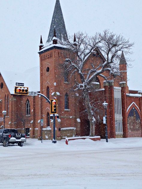 St. John's Presbyterian, Medicine Hat, Alberta with it's famous ancient cottonwood.....in a snowstorm. Medicine Hat, Model Town, Canada Day, Snow Storm, Place Of Worship, Alberta Canada, Worship, Medicine, Favorite Places