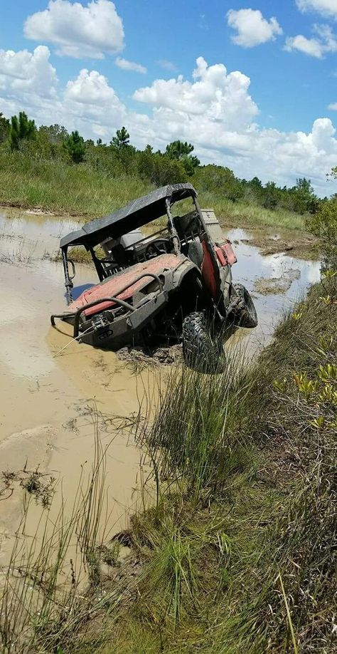 Mudding vehicles, also known as off-road trucks or mud boggers, are specially designed machines built to tackle the toughest terrain and conquer muddy trails with ease. These rugged vehicles are beloved by outdoor enthusiasts and adrenaline junkies alike for their ability to navigate through mud pits, swampy terrain, and rugged trails without breaking a sweat. Let's take a closer look at the world of mudding vehicles and why they're so popular among off-road enthusiasts. Mud Riding, Best Off Road Vehicles, Off Road Vehicles, Polaris Off Road, Rural Photography, Lake Camp, Honda Pioneer, Four Wheeling, Stuck In The Mud