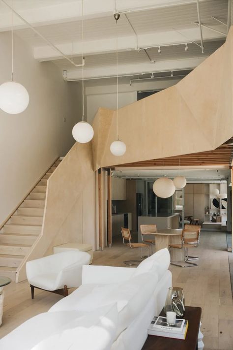 OWIU Studio brings Japanese style to Biscuit Loft apartment in LA Concrete Kitchen Island, Los Angeles Apartments, Guest Bedroom Design, Circular Dining Table, Modernist Architects, Concrete Kitchen, Whidbey Island, Wooden Staircases, Style Loft