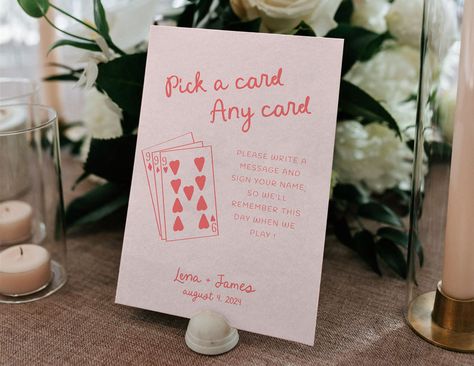 🤍SALES🤍 Buy THREE items and save 15% with code SAVE15 Buy FOUR items and save 25% with code SAVE25 Looking for a creative way to personalize your wedding guest book? With our "Pick a Card" sign template, you can add a fun and unique touch to your special day. This playing cards guestbook sign is perfect for a minimalist wedding looking to stand out. Let your guests sign your guestbook with this editable sign template, featuring hand-drawn illustrations that will make your guest book signing ex Pink Encouraged Wedding Guest, Custom Wedding Playing Cards, Pick A Card Any Card Guest Book, Deck Of Cards Guest Book, Playing Card Guest Book, This Is Your Sign To, Guest Book Creative, Personal Wedding Touches, Card Guest Book