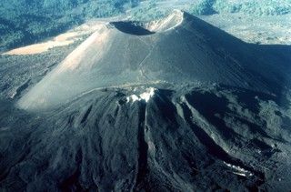 The renowned Parícutin cinder cone, which grew from a Mexican cornfield beginning in 1943, is one of the roughly 1000 cinder cones dotting the massive Michoacán-Guanajuato volcanic field in central Mexico. White fumarolic sublimate minerals blanket the top of Nuevo Juatita in the foreground, a NE-flank vent that was the main source of lava flows during the last five years of the 1943-1952 eruption. Paricutin Volcano, Cinder Cone Volcano, Lava Dome, Shield Volcano, Lava Flow, Active Volcano, Seven Wonders, Volcano, Nicaragua