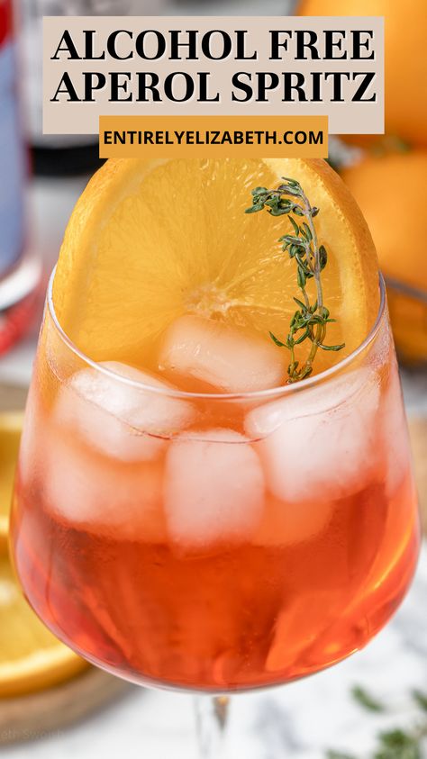 Spritz Mocktail, Aperol Spritz Recipe, Spritz Recipe, Alcohol Free Drinks, Drink Recipes Nonalcoholic, Non Alcoholic Cocktails, Orange Slice, Soda Water, Summer Cocktail