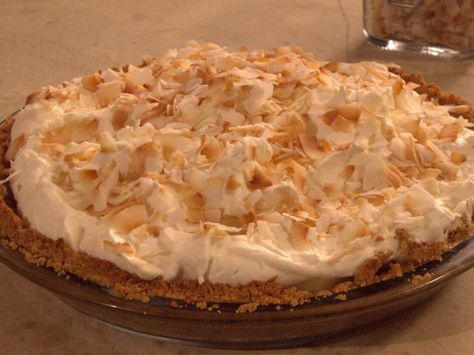 Banana and Coconut Cream Pie with Graham Cracker Crust recipe from Nancy Fuller via Food Network Farmhouse Rules Recipes, Crepe Ideas, Pie With Graham Cracker Crust, Nancy Fuller, Graham Cracker Crust Recipe, Farmhouse Recipes, Toasted Coconut Chips, Yummy Pies, Butter Pastry