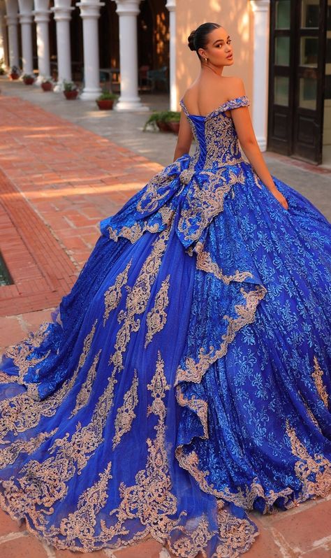 Long glitter off the shoulder quinceanera ball gown with lace embroidery. Blue Charro Quinceanera Dresses, Royal Blue And Gold Quinceanera, Gold Quince Dress, Yellow Quinceanera Dress, Royal Blue Quinceanera Dresses, Royal Blue Quince, Royal Blue Quinceanera, Xv Dresses, Quinceanera Dresses Gold