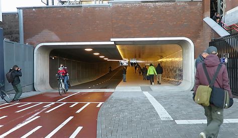 The new bike and pedestrian tunnel of Amsterdam Pedestrian Tunnel, Under Bridge, Public Realm, Bike Lane, Bike Parking, Pedestrian Bridge, Urban Architecture, Street Furniture, Urban Lifestyle