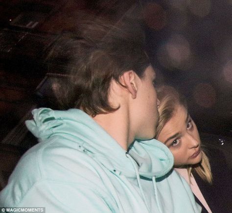 Two's company: Chloe Grace Moretz added more fuel to the rumours she is dating Brooklyn Beckham after she rested her head on his shoulder and cosied up to him in the back of their car in London on Monday Resting Head On Shoulder Couple Aesthetic, Resting Head On Shoulder Couple, Head On Shoulder Couple, Head On His Shoulder, Head On Shoulder, Chloe Grace Mortez, Brooklyn Beckham, Aesthetic Posters, Chloe Moretz