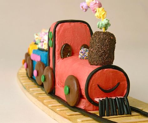 From the cover our the famous Women's Weekly Birthday Cake Book comes this adorable and nostalgic choo-choo train. Birthday Cake Book, Swimming Pool Cake, Thomas Train Cake, Thomas Cakes, Cake Book, Train Birthday Cake, Pool Cake, Purple Food Coloring, Train Cake