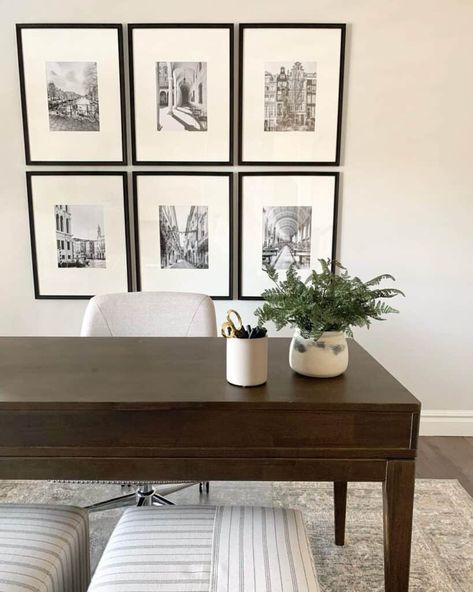 Dark Wood Desk in Home Office with Striped Ottomans - Soul & Lane Cream Office Chair, Cream Office, White Photo Wall, Home Office Dark, Dark Wood Desk, Dark Wood Furniture, In Home Office, Black And White Photo Wall, Dark Kitchen