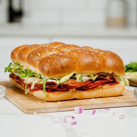 Italian Grinder Sliders Recipe Italian Grinder Sliders, Grinder Sliders, Italian Grinder Sandwich, Italian Grinder, Grinder Sandwich, Easy Sandwich, Sliced Salami, Pepperoncini Peppers, Sandwich Ideas