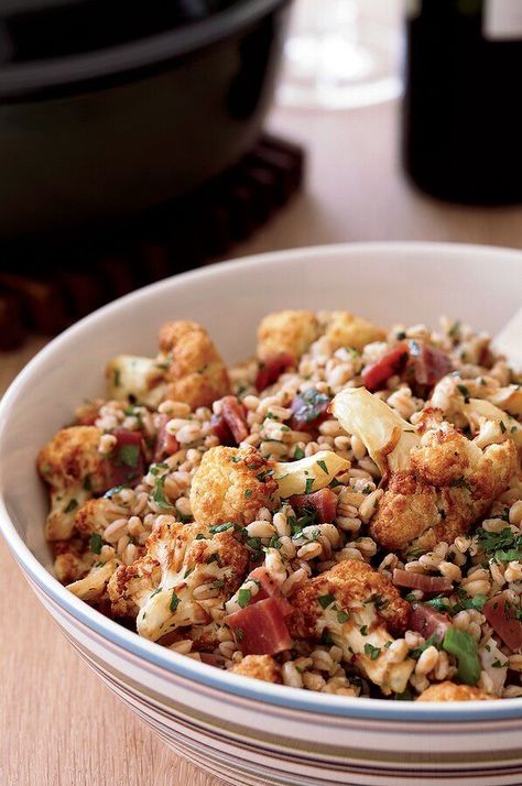 Cooks in Italy fry cauliflower to bring out its nuttiness. Here, Ethan Stowell deep-fries it for a salad with salty prosciutto and nubby farro (a variety of whole-grain wheat).#grain #grainrecipes #salads #summer Fry Cauliflower, Salads Summer, Prosciutto Recipe, Farro Recipes, Prosciutto Recipes, Seasonal Salad, Farro Salad, Roasted Root Vegetables, Fried Cauliflower