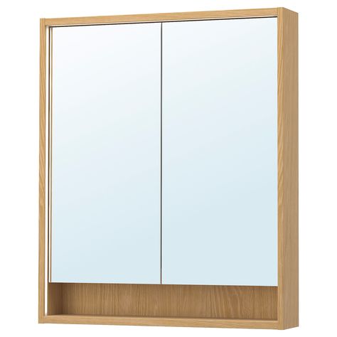 A mirror cabinet that charms with the warm look of wood combined with integrated lighting that brightens the space and helps you to carry out your routines. FAXÄLVEN Mirror cabinet w built-in lighting -80x15x95 cm Color:Oak effect Integrated Lighting, Bathrooms Ideas, Ikea Food, Kids Flooring, Tempered Glass Door, Frame Shelf, Ikea Home, Kitchen Installation, Mirror Cabinet