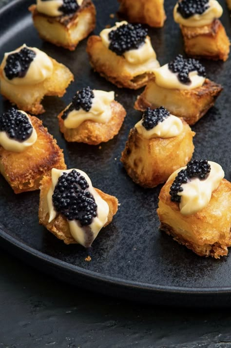 Elevate your side dish game with these crispy roast potatoes, perfectly paired with a rich miso mayo and topped with luxurious caviar. This recipe combines the comforting crunch of golden potatoes with the umami depth of miso and the indulgent touch of caviar, creating a truly unforgettable culinary experience. Perfect for special occasions or when you simply want to treat yourself to something extraordinary. Caviar Appetizers, Golden Potatoes, Crispy Roast Potatoes, Canapes Recipes, Caviar Recipes, Fancy Appetizers, Fancy Dishes, White Miso, Roast Potatoes