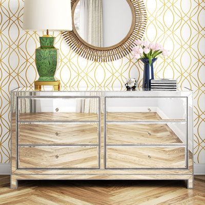 This 6-drawer double dresser gives you plenty of space to tuck away linens, blankets, and clothes while also showcasing some glam style. It has a solid and engineered wood frame with a silver finish. All the surfaces are fitted with beveled mirror panels that scatter light throughout your space for a wide-open feel. Clear, crystal knobs on each drawer invite you to open them and organize your entire wardrobe. A wall anchor is also included for added safety. Best of all? No assembly is required. Dresser Wood, Mirror Panels, Wayfair Furniture, Double Dresser, 6 Drawer Dresser, Adjustable Beds, Drawer Nightstand, Upholstered Platform Bed, Dresser With Mirror